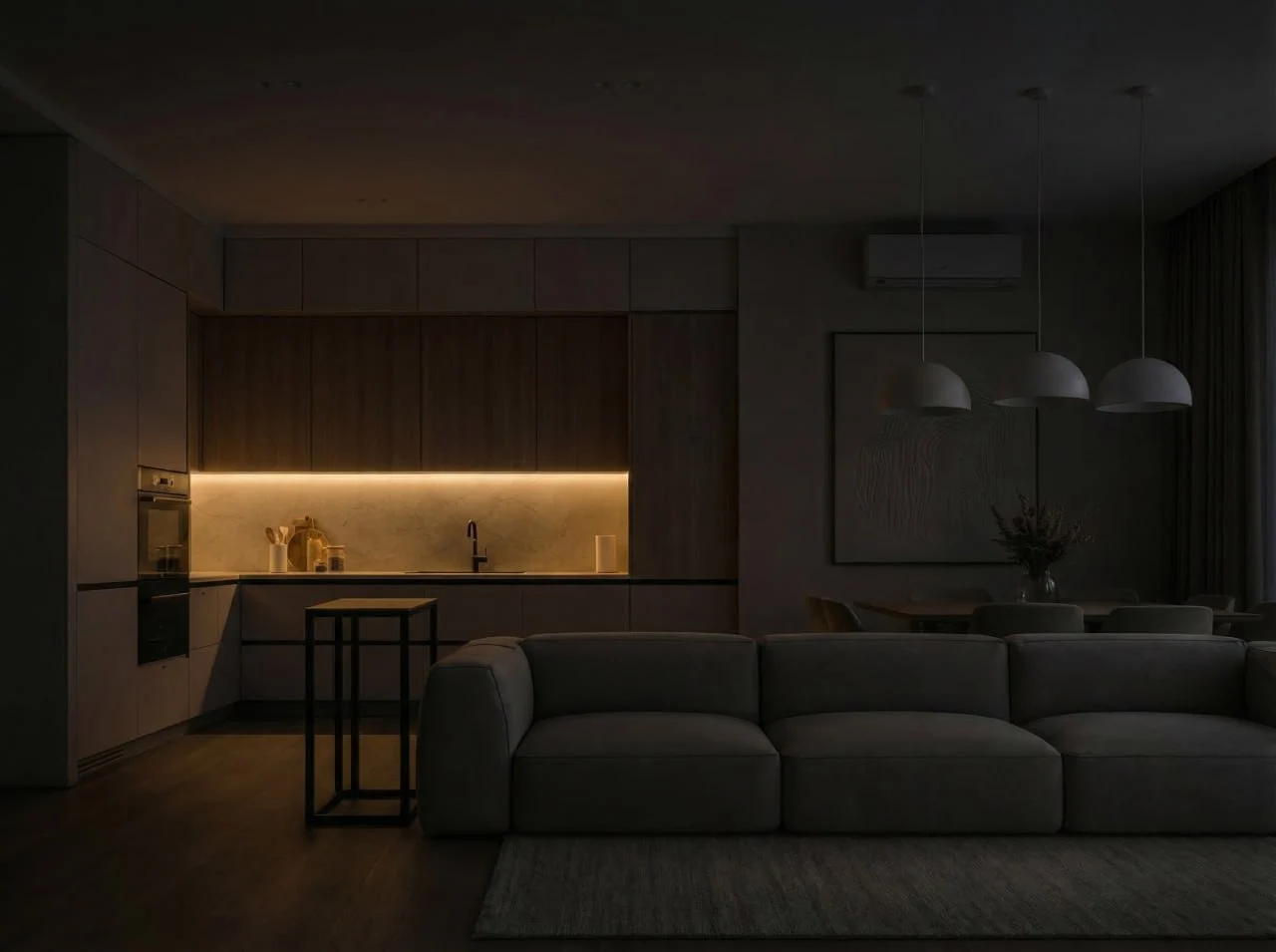 Ambientní nepřímé osvětlení v moderním obývacím pokoji s kuchyní